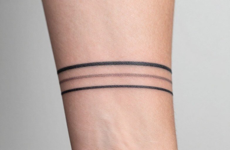 Parallel Lines Tattoo Meaning: Three Stripes of Purpose