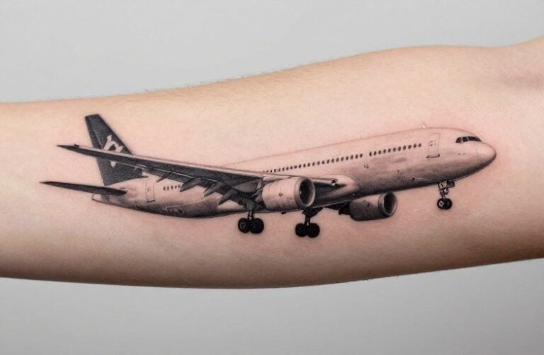 Aeroplane Tattoo Meaning: Travel, Freedom & Adventure
