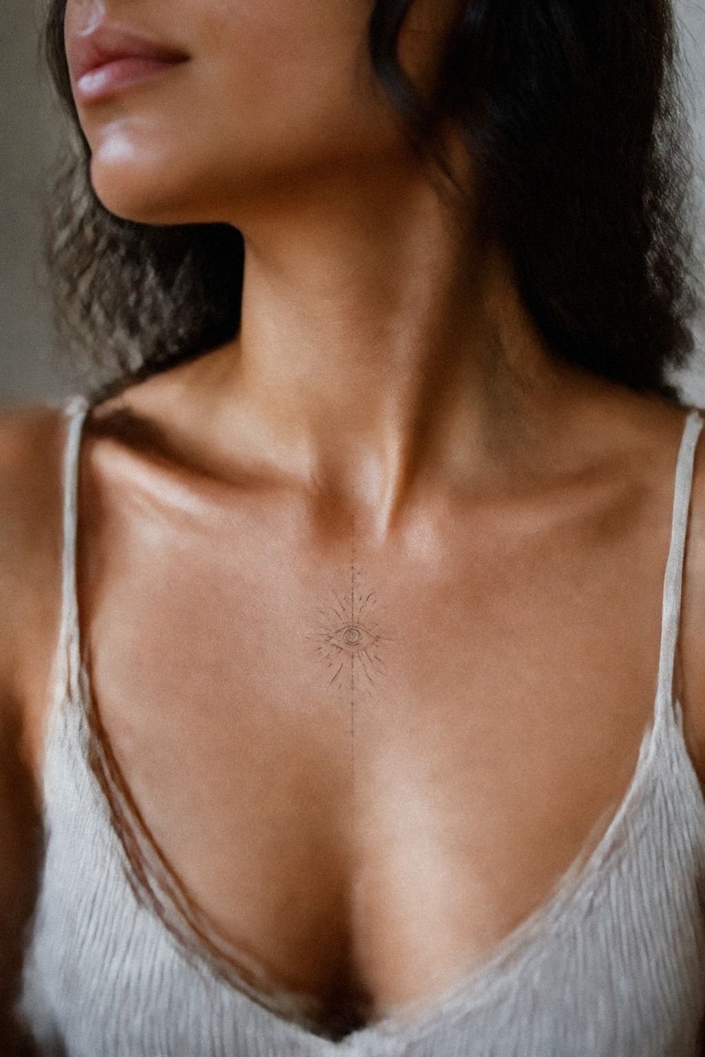 Place A Third Eye Sternum Tattoo