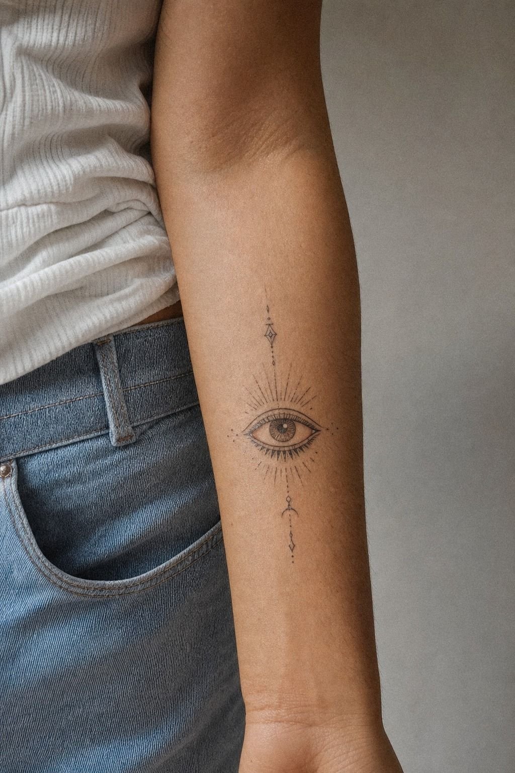 Place A Metaphysical Eye Forearm Tattoo