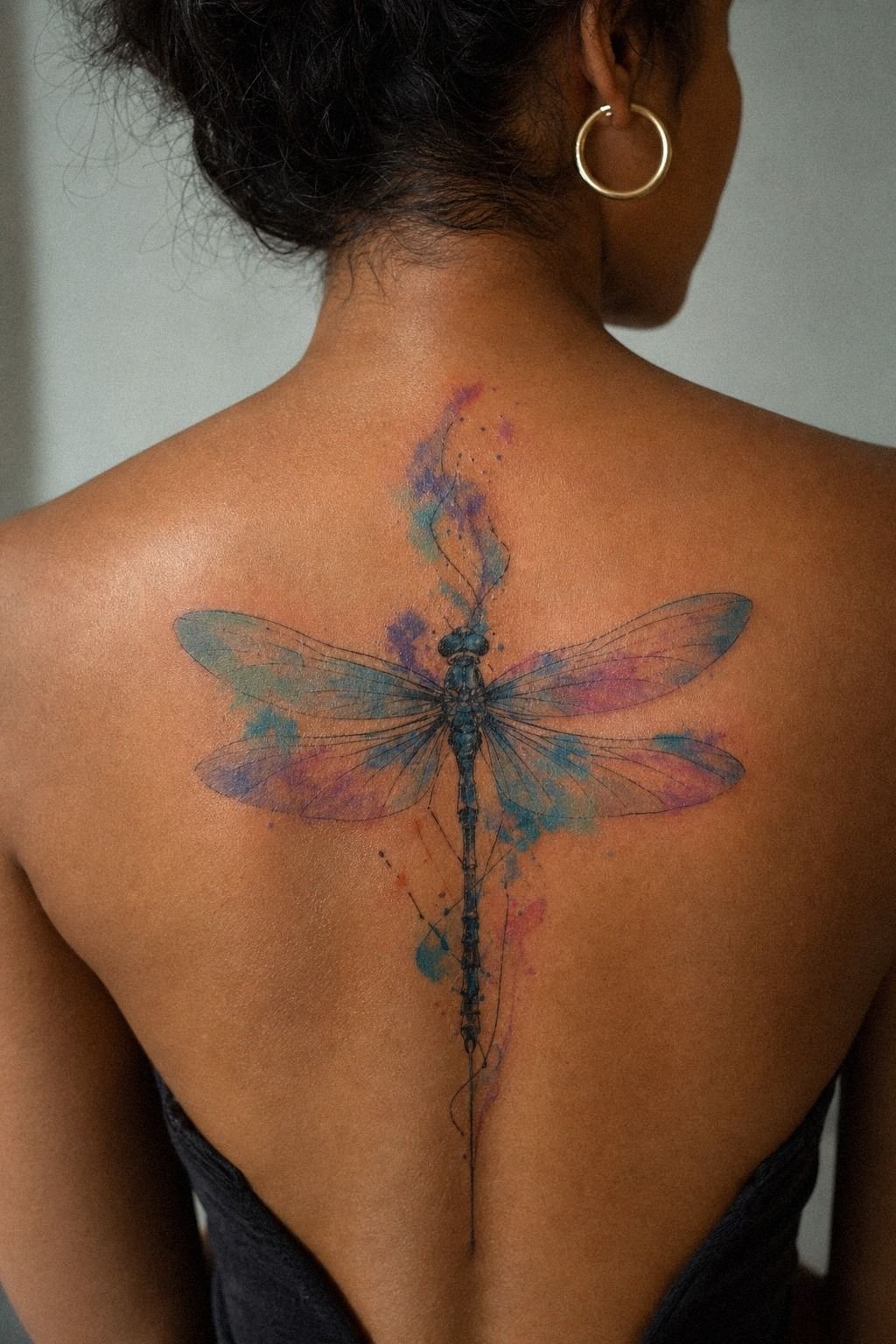 Watercolor Dragonfly Spine Tattoo