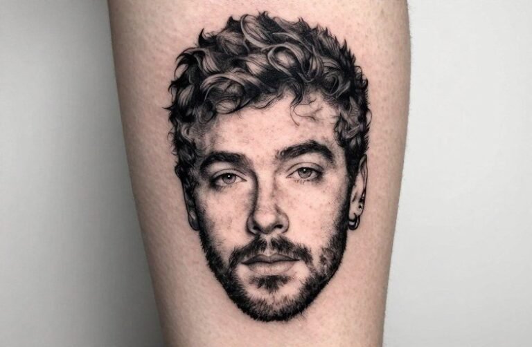 Post Malone Face Tattoo Meaning: Broken Sword & Barbed Wire