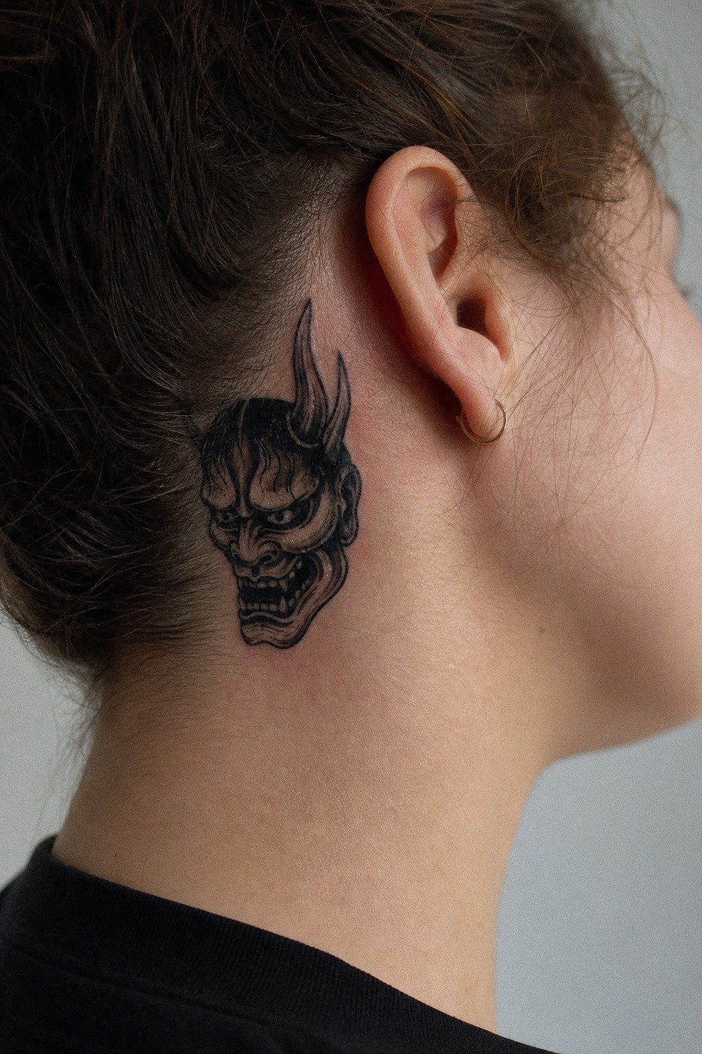 Oni Mask Tattoo With Heavy Blackwork Shading