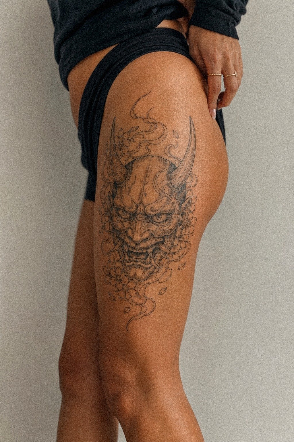 Why Put an Oni Mask Tattoo on the Thigh?