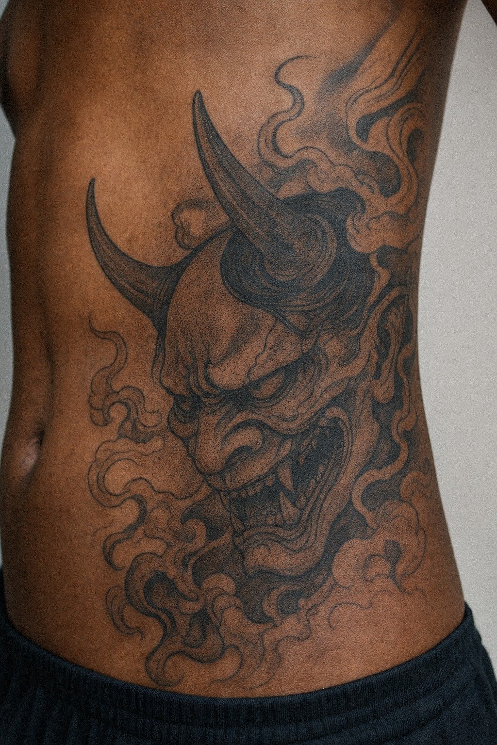Dotwork Oni Mask Tattoo With Smoke