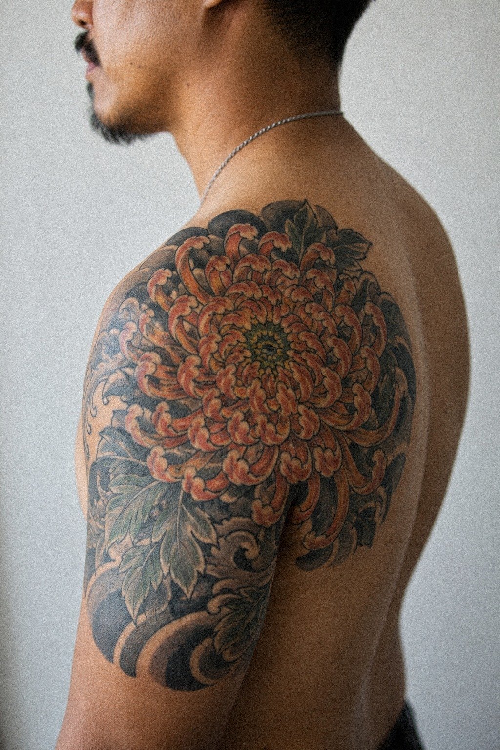 Center a Chrysanthemum Across the Shoulder Cap