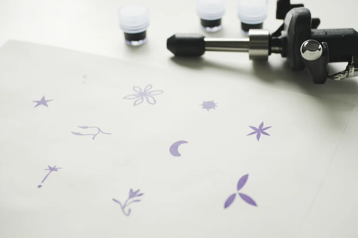 Simple tattoo symbols on transfer paper