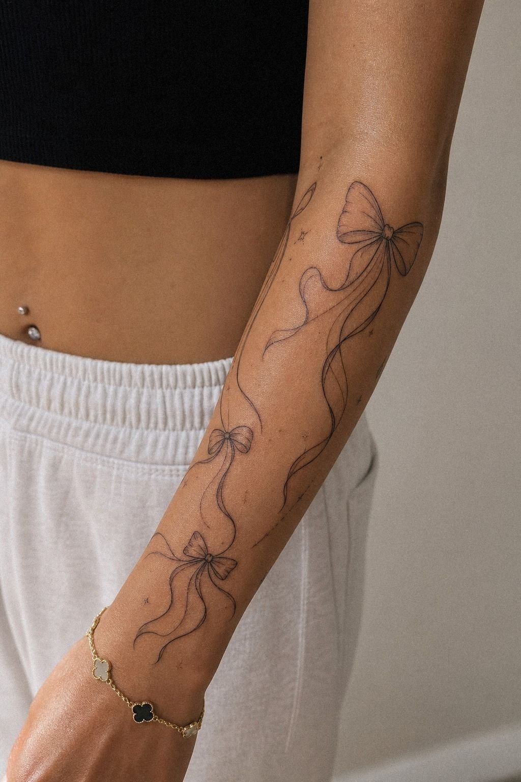 Fine Line Bow Sleeve Tattoo