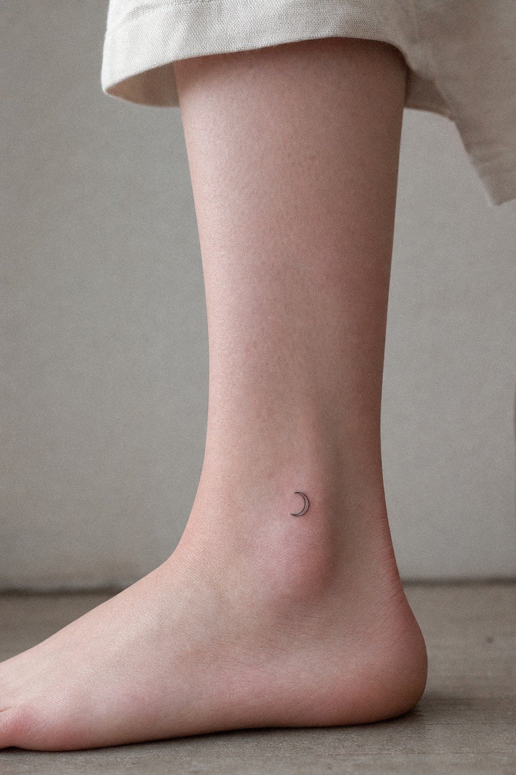 Start With A Tiny Crescent Moon Tattoo