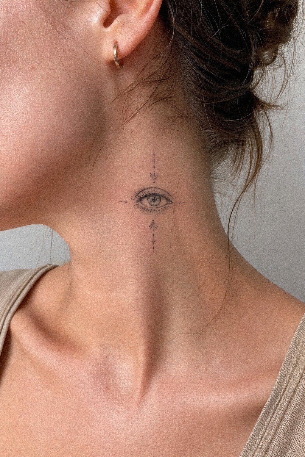 Add A Third Eye Neck Tattoo