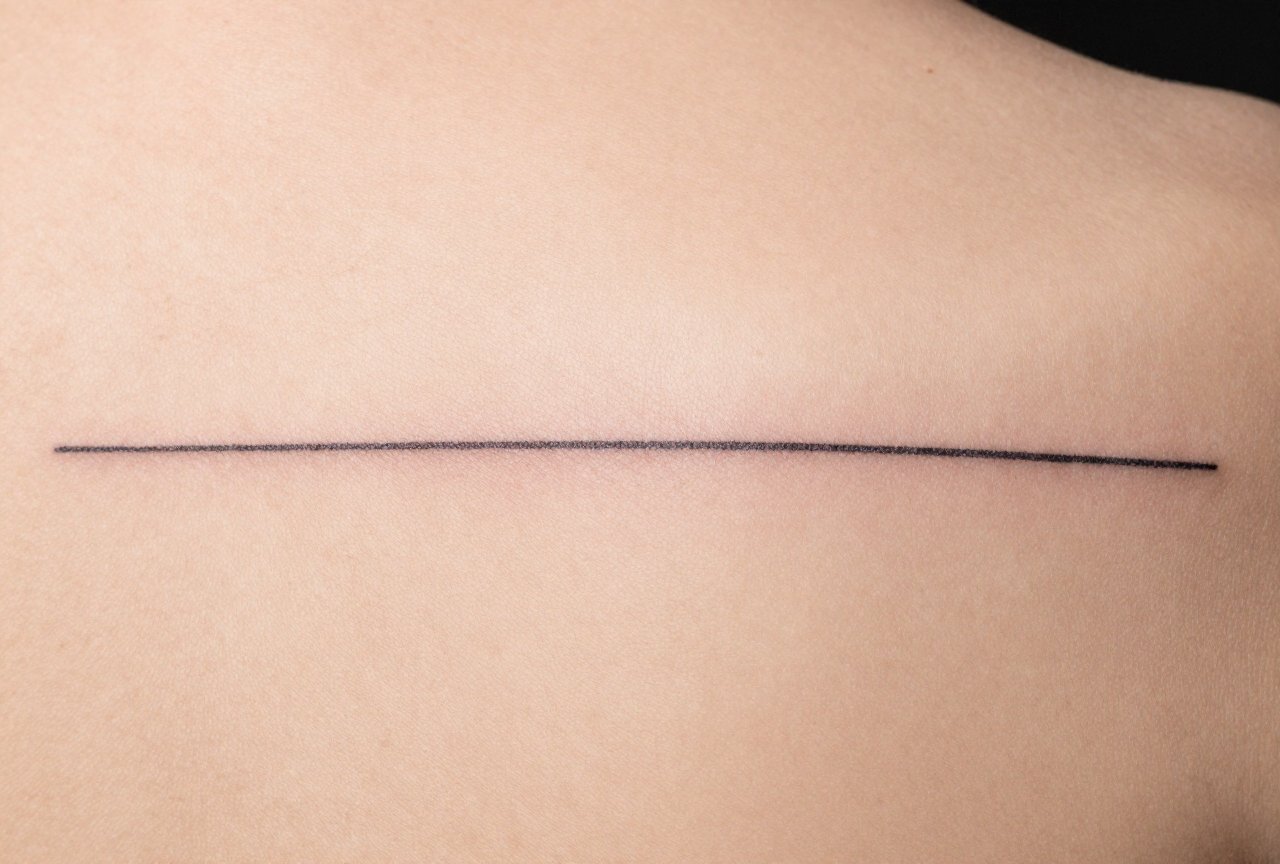 Straight Line Tattoo Meaning: Symbolism, Styles & Why People Get It