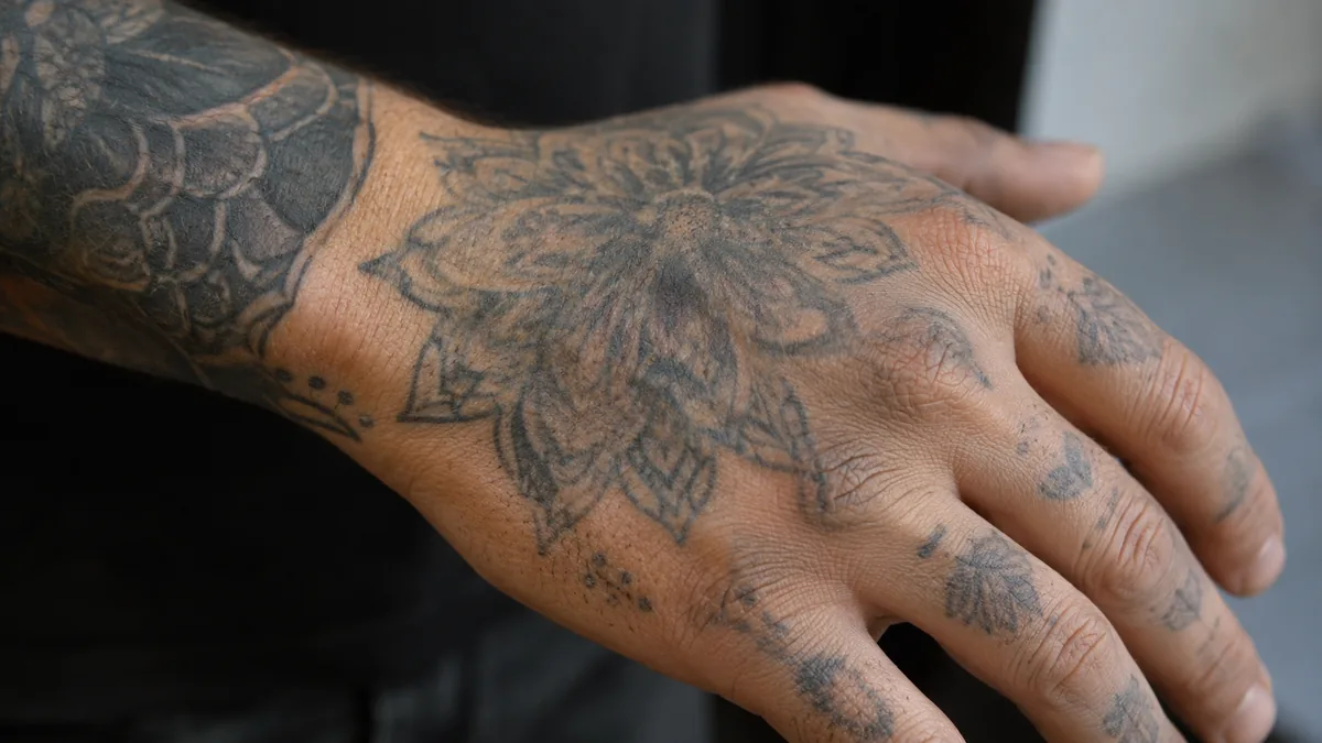 Hand Tattoos:, Pain, Fading and Styles That Last - Why hand tattoos fade faster than the rest