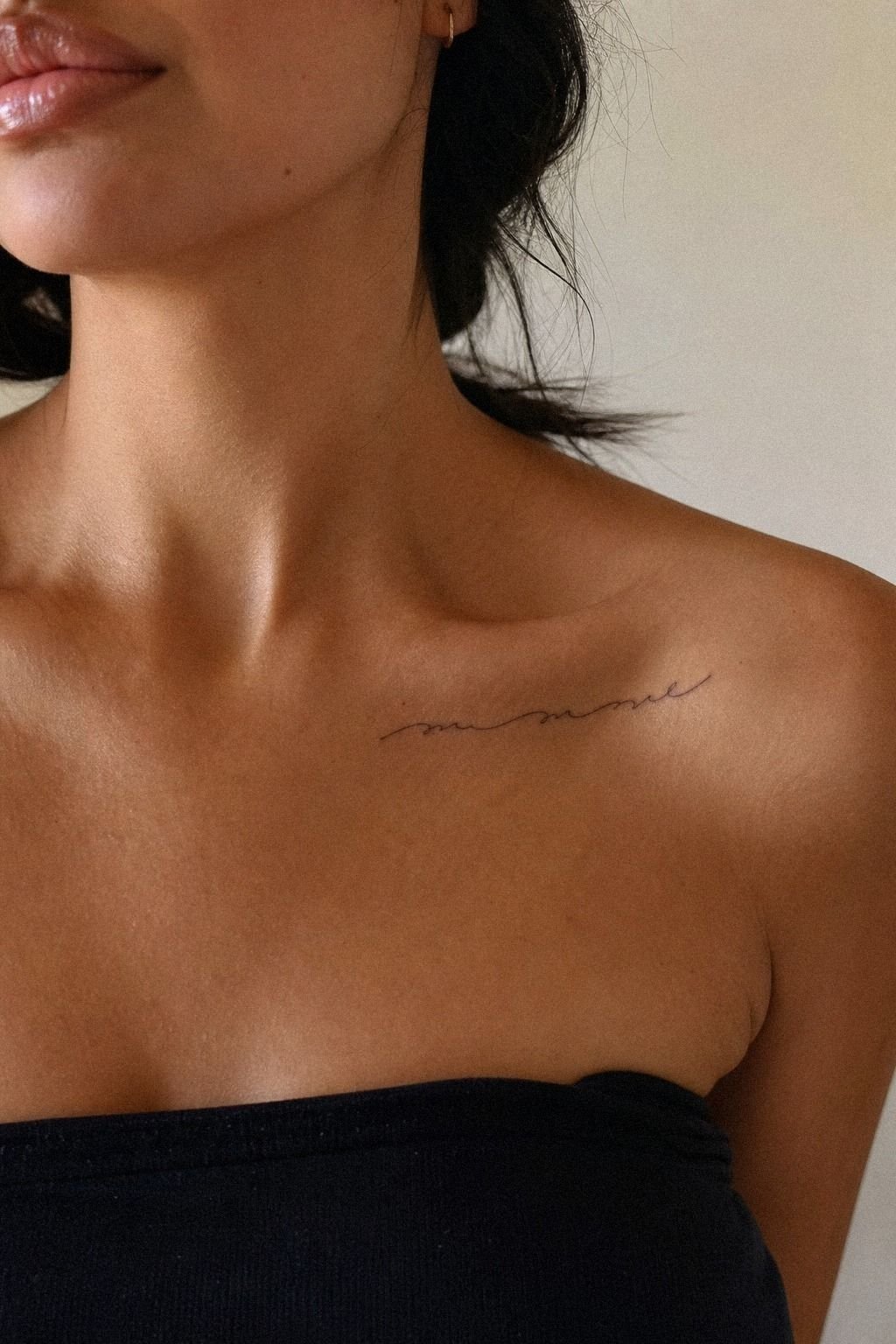 Cute Cursive Name Collarbone Tattoo