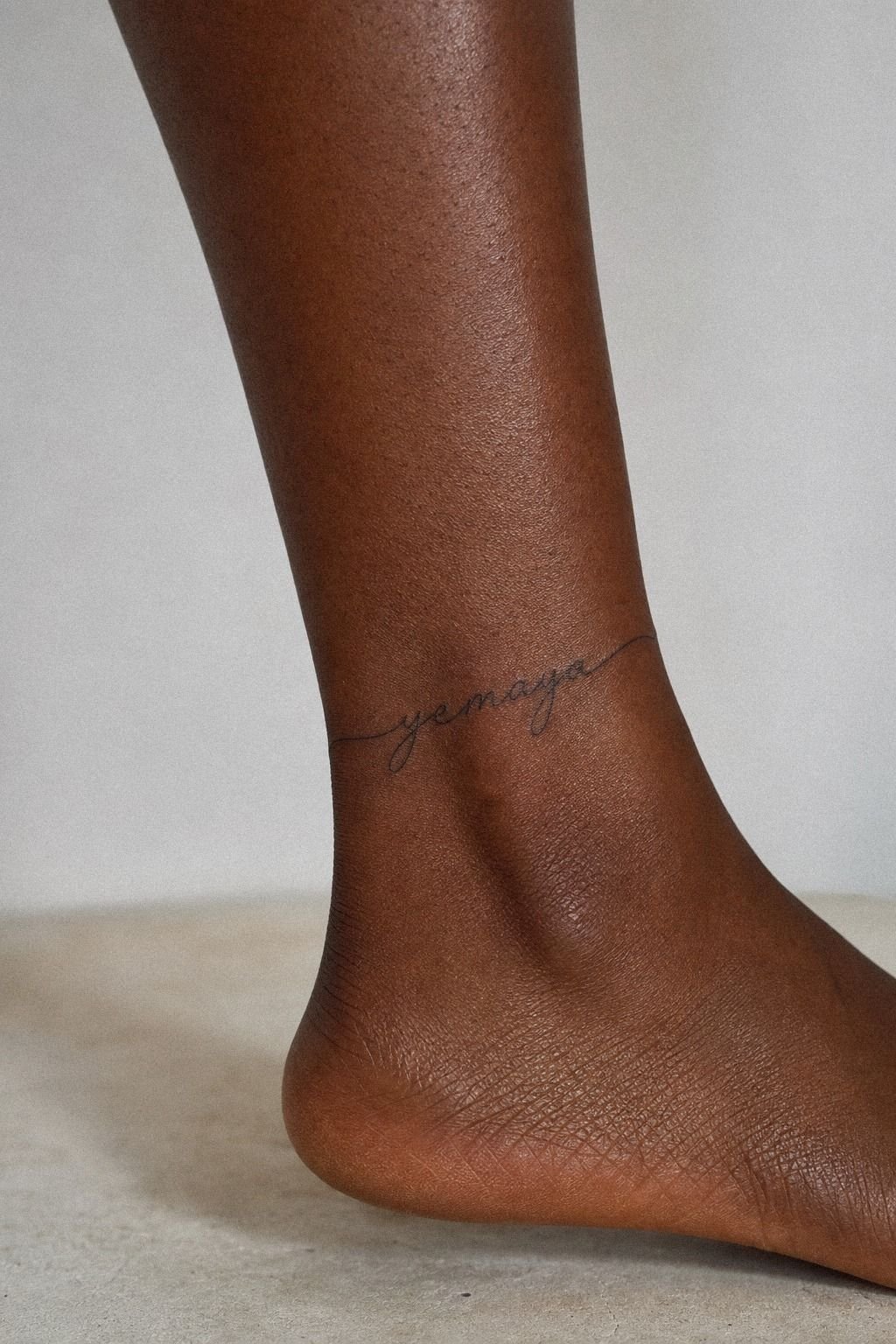 Single Needle Name Ankle Tattoo