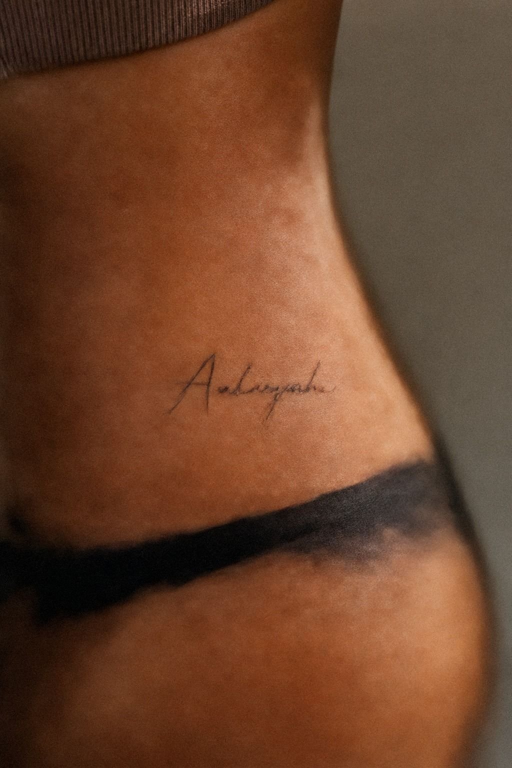 Small Name Tattoo On Hip