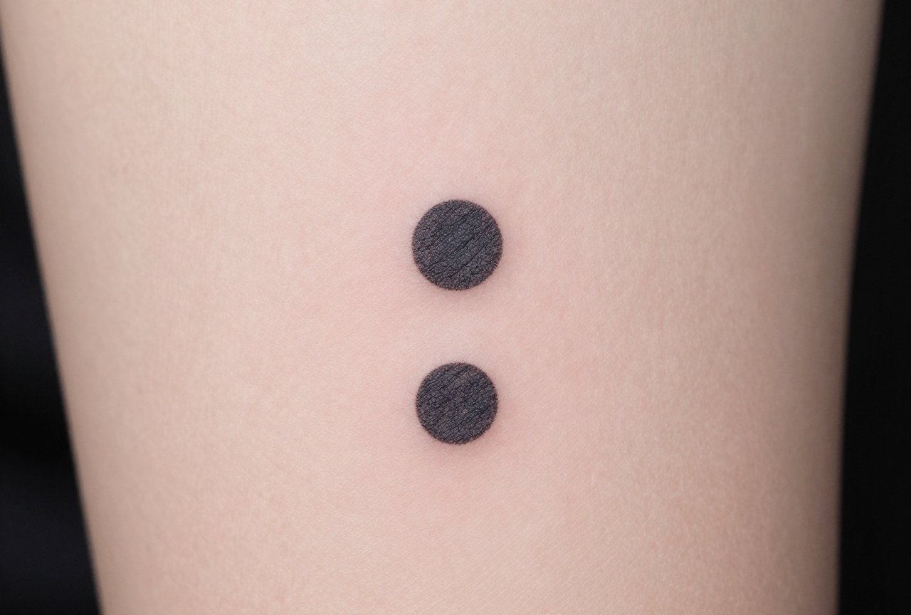Two Dots Tattoo Meaning: Symbolism, Styles & Personal Stories