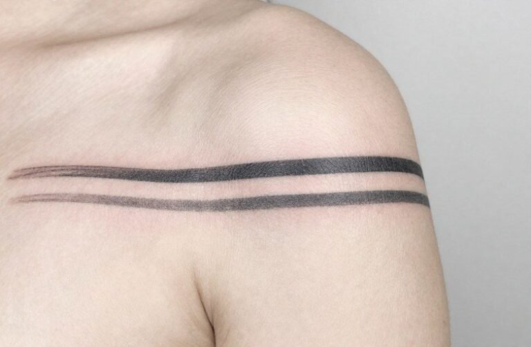 Two Stripes Tattoo Meaning: Symbolism, Styles & Placement