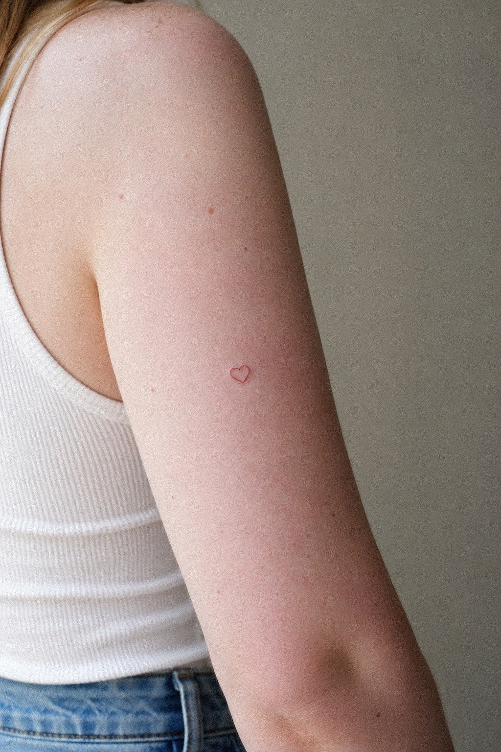 Crown a Tiny Red Ink Heart on the Outer Arm