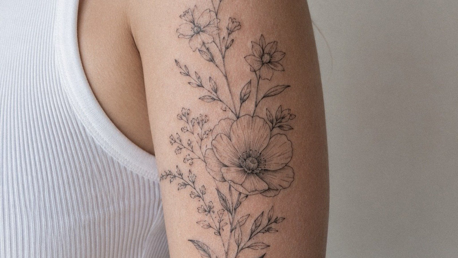 13 Upper Arm Tattoos For Women That Hold Shape For Years