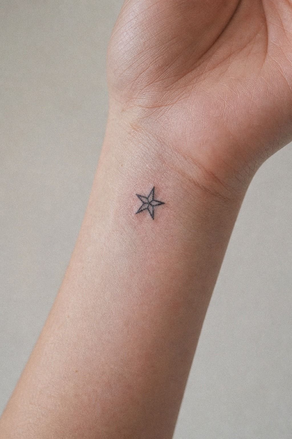 Pick A Tiny Star Side Wrist Tattoo