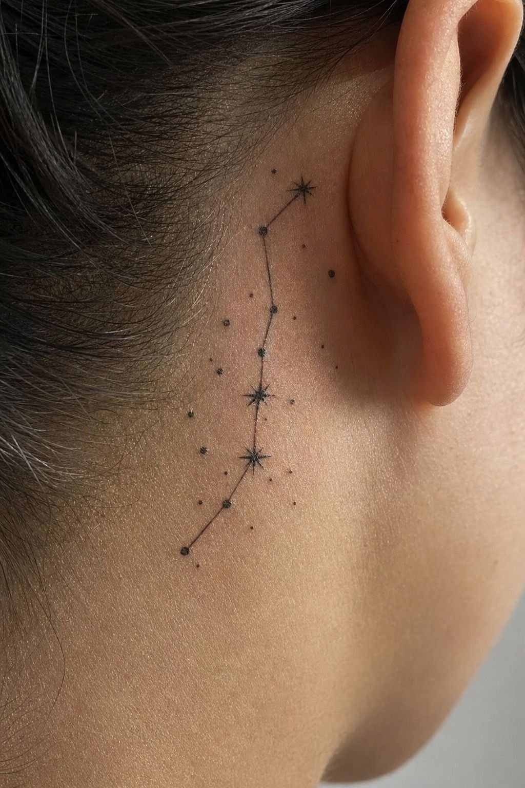 What does a tiny constellation behind the ear actually look like healed?