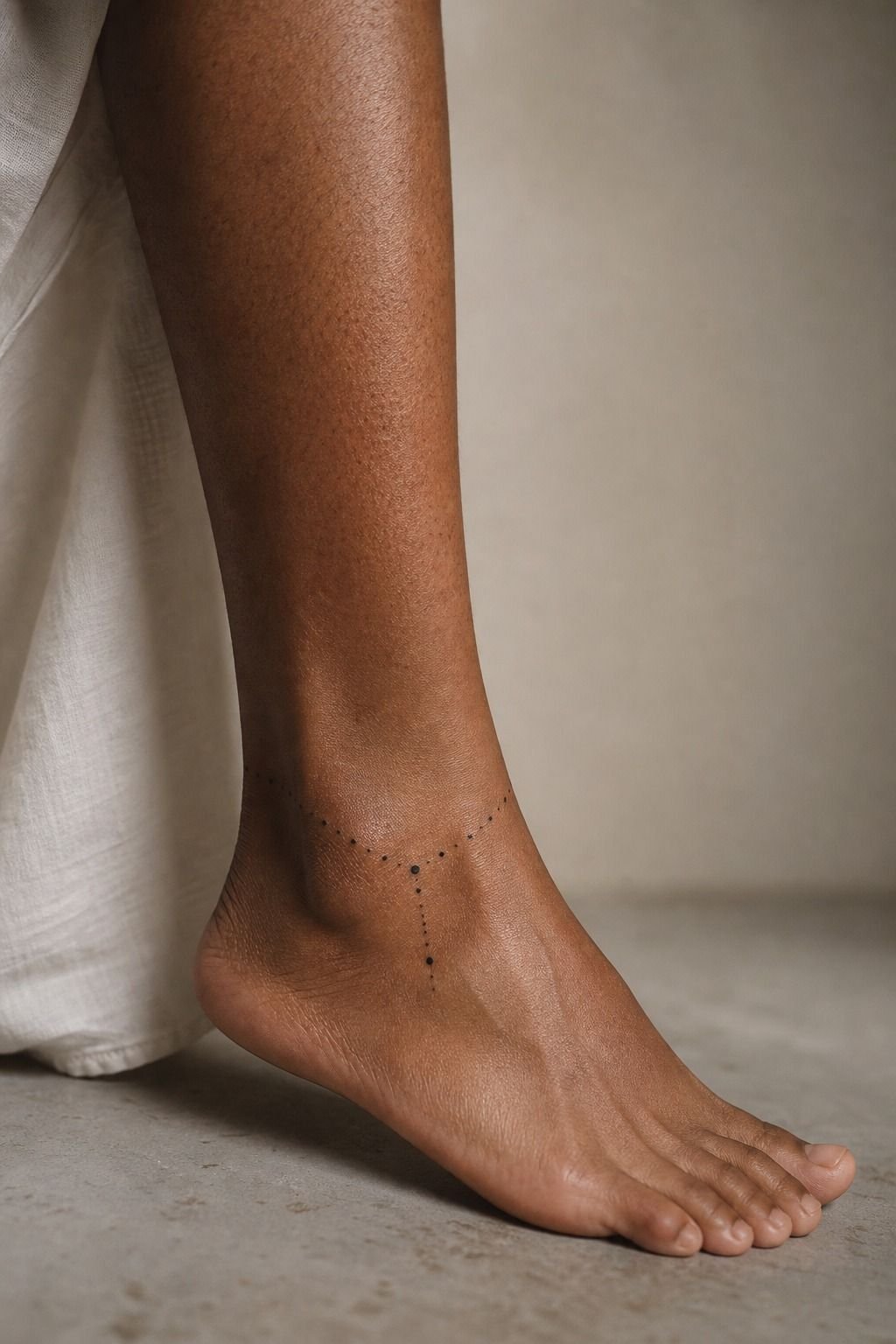 Frame the ankle bone with a small constellation