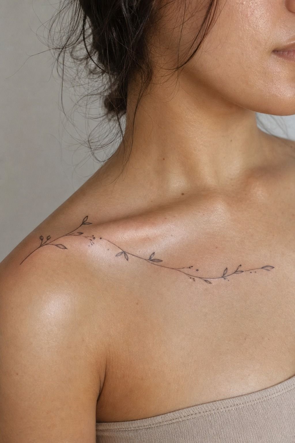 Tuck a single-needle word into the collarbone hollow