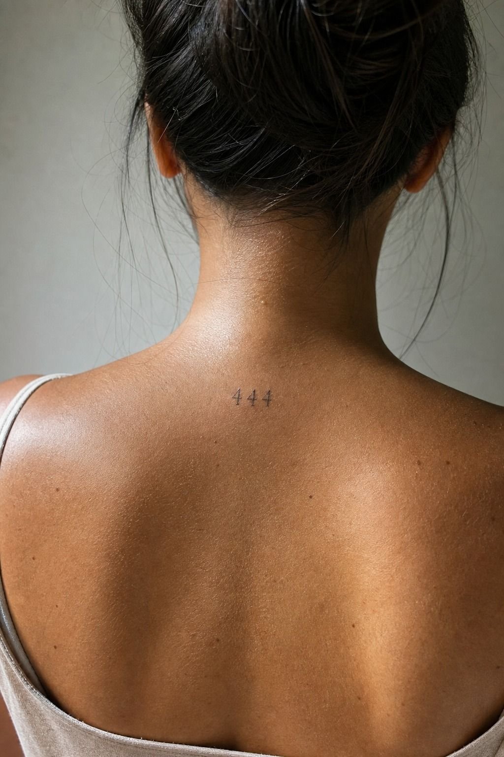Small Angel Number Neck Back Tattoo