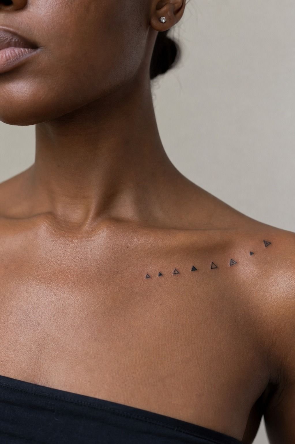 I Simplified Tiny Triangles Before Tattooing (Collarbone, Deep Brown Skin With Warm Undertone)