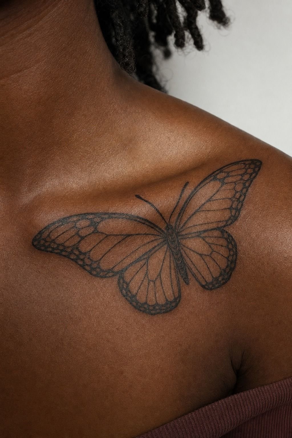 Jean Cocteau lines on the collarbone