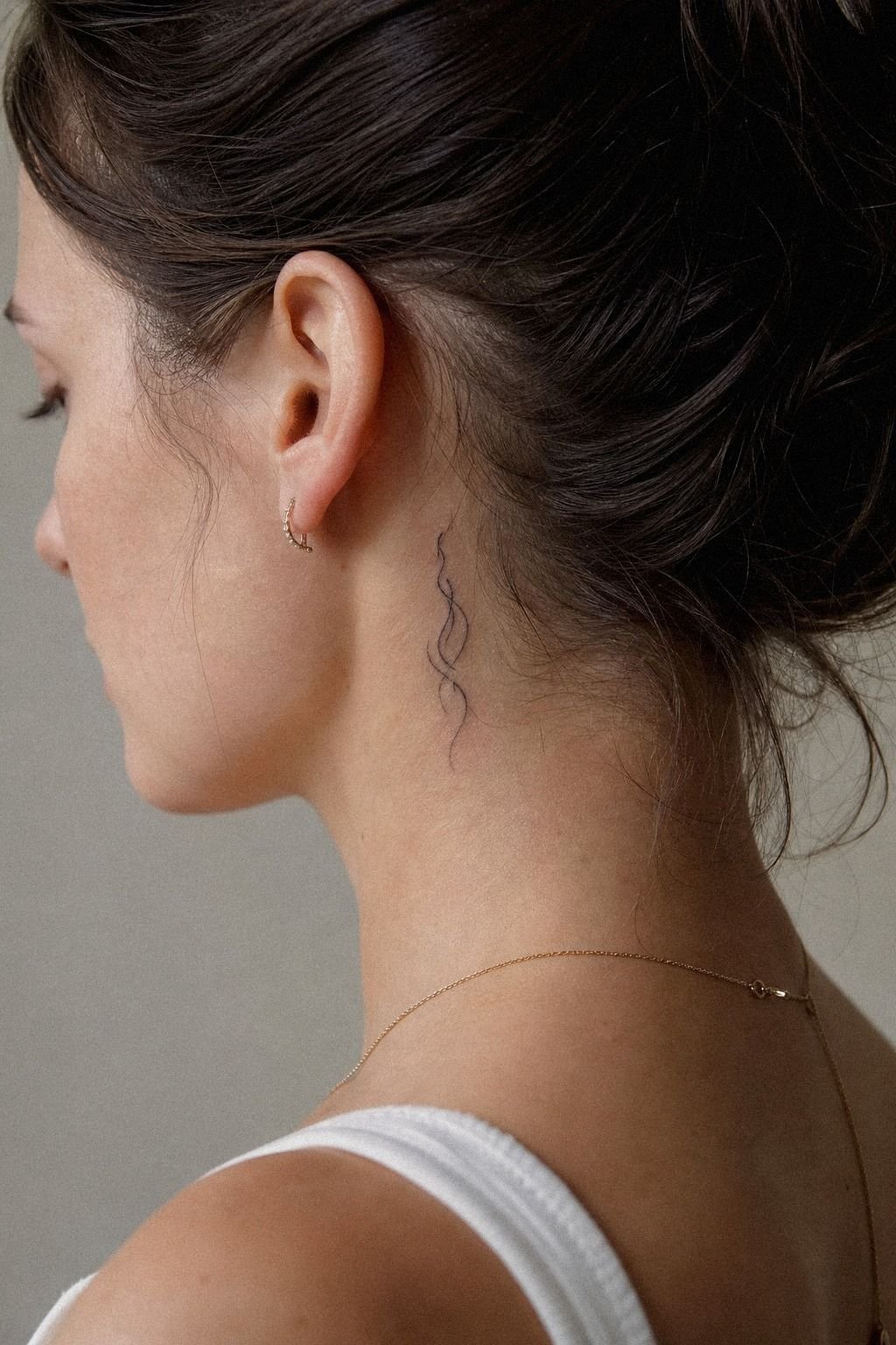 Small Neck Word Tattoo Behind The Hairline