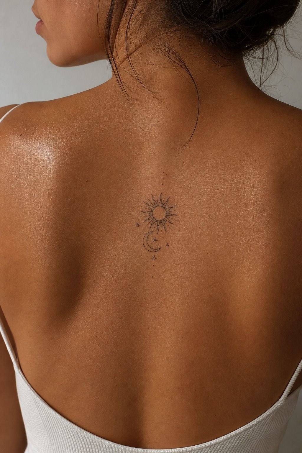 Tiny Sun And Moon Back Tattoo