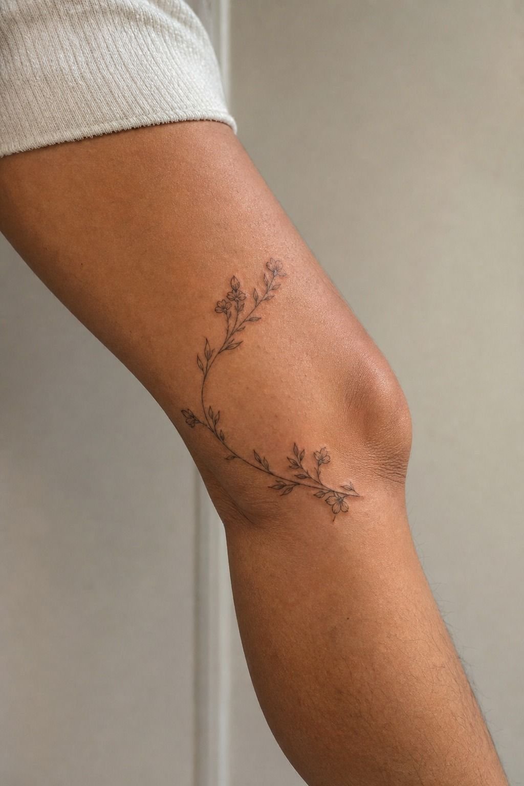 Place fine-line florals along the inner knee curve