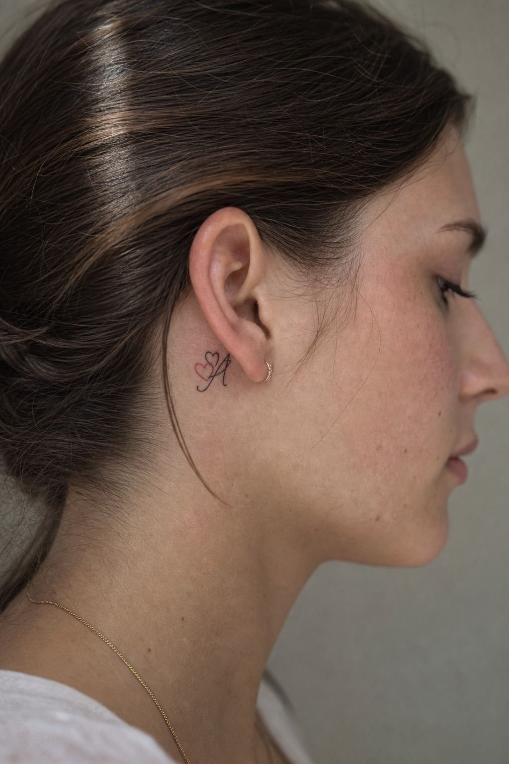 Red Heart And Initial Tattoo