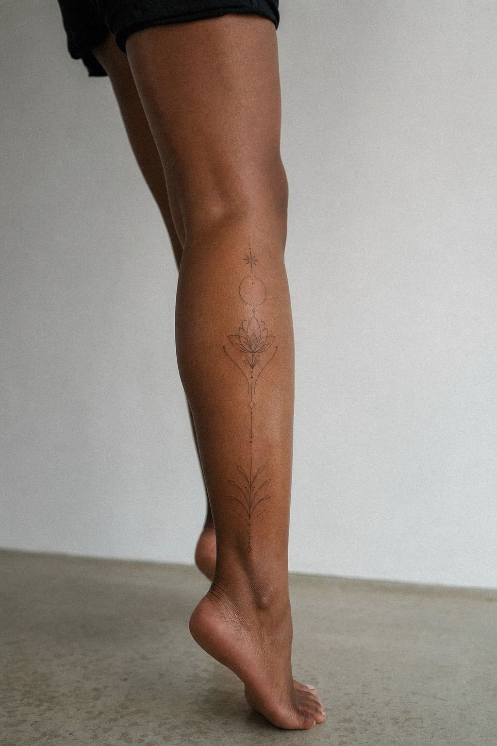 Shin to Calf Tattoo With Fine Linework
