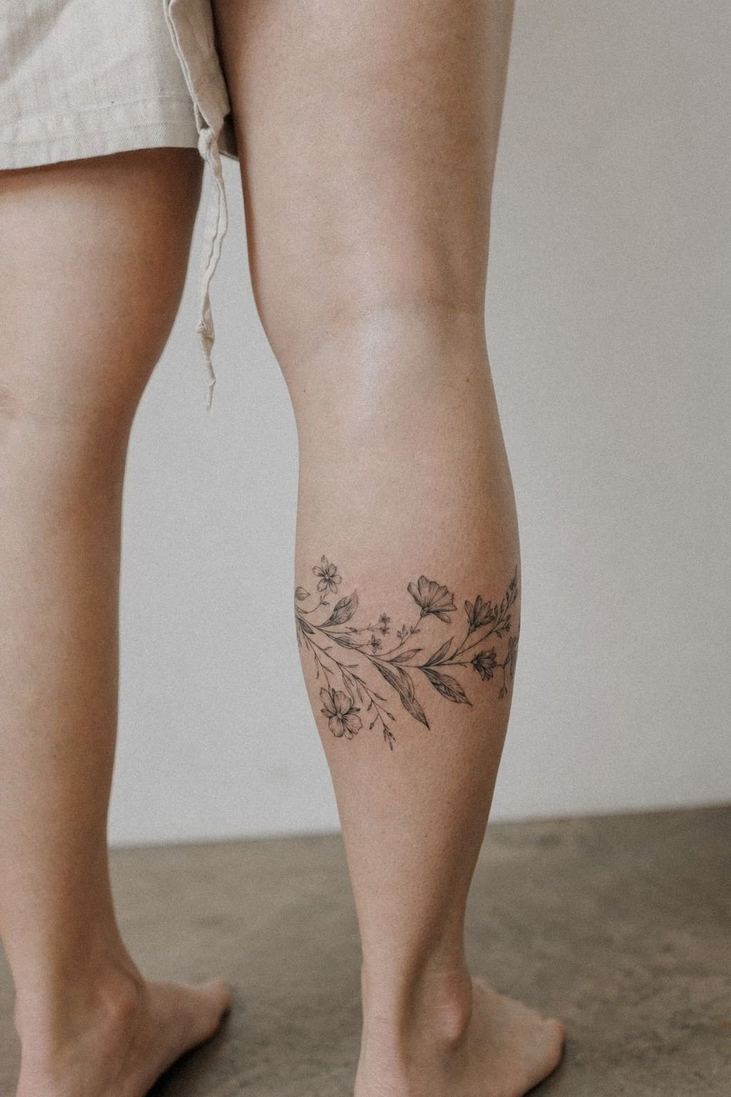 Healed Calf Tattoo With Soft Black Shading