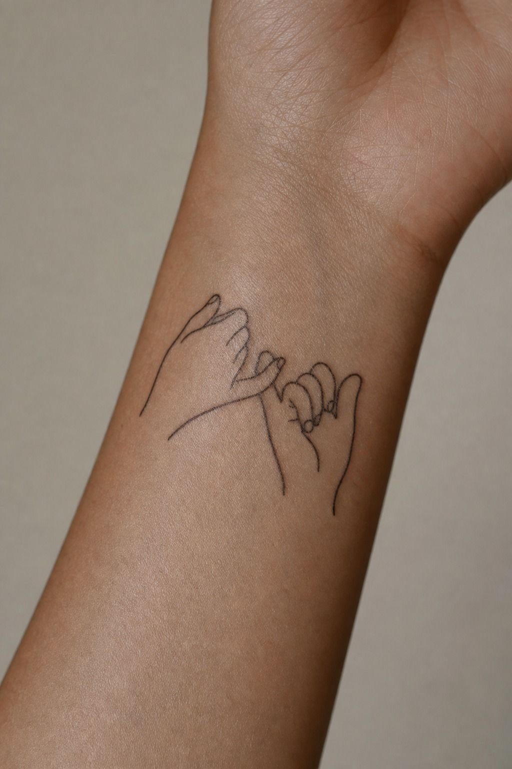 Fine Line Pinky Promise Wrist Tattoos