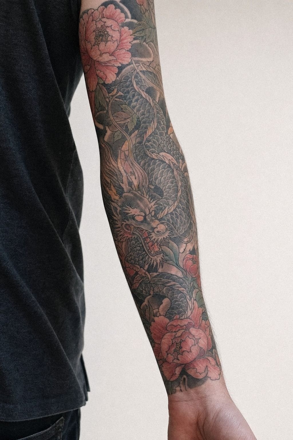 Japanese Dragon And Peony Sleeve Tattoo