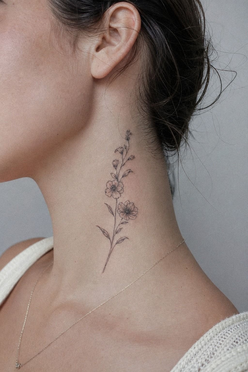 Fine Line Side Neck Flower Tattoo