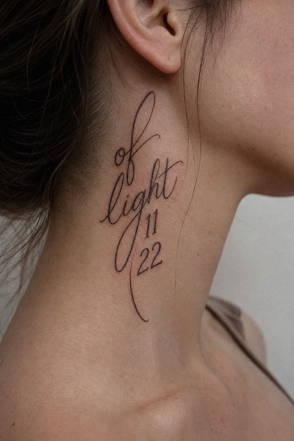 Side Neck Tattoo With Angel Numbers