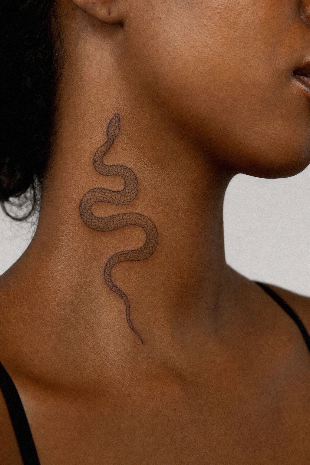 Side Neck Tattoo With Snake Linework