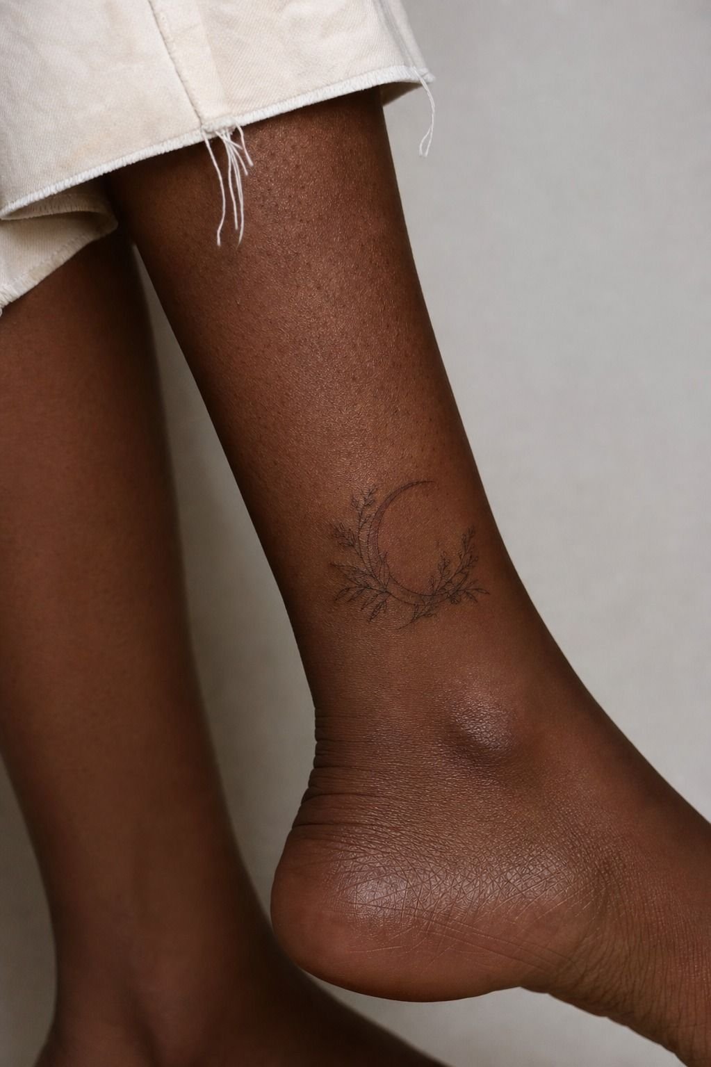 Botanical Half Moon Ankle Tattoo