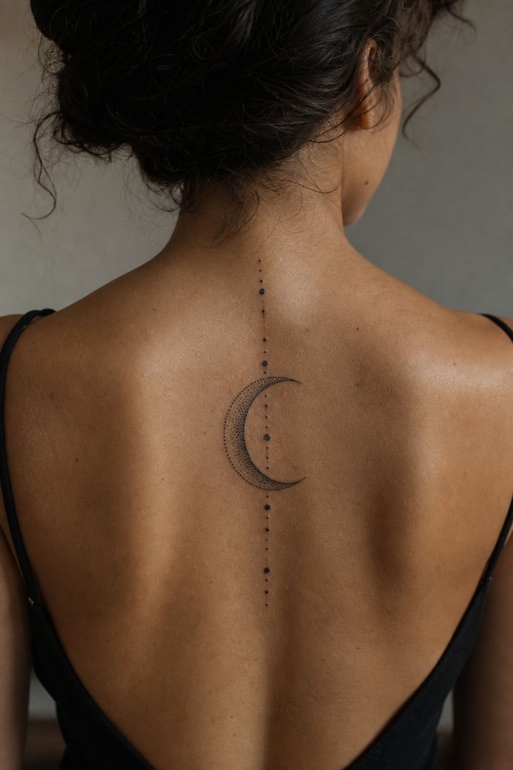 Half Moon Spine Tattoo With Dots