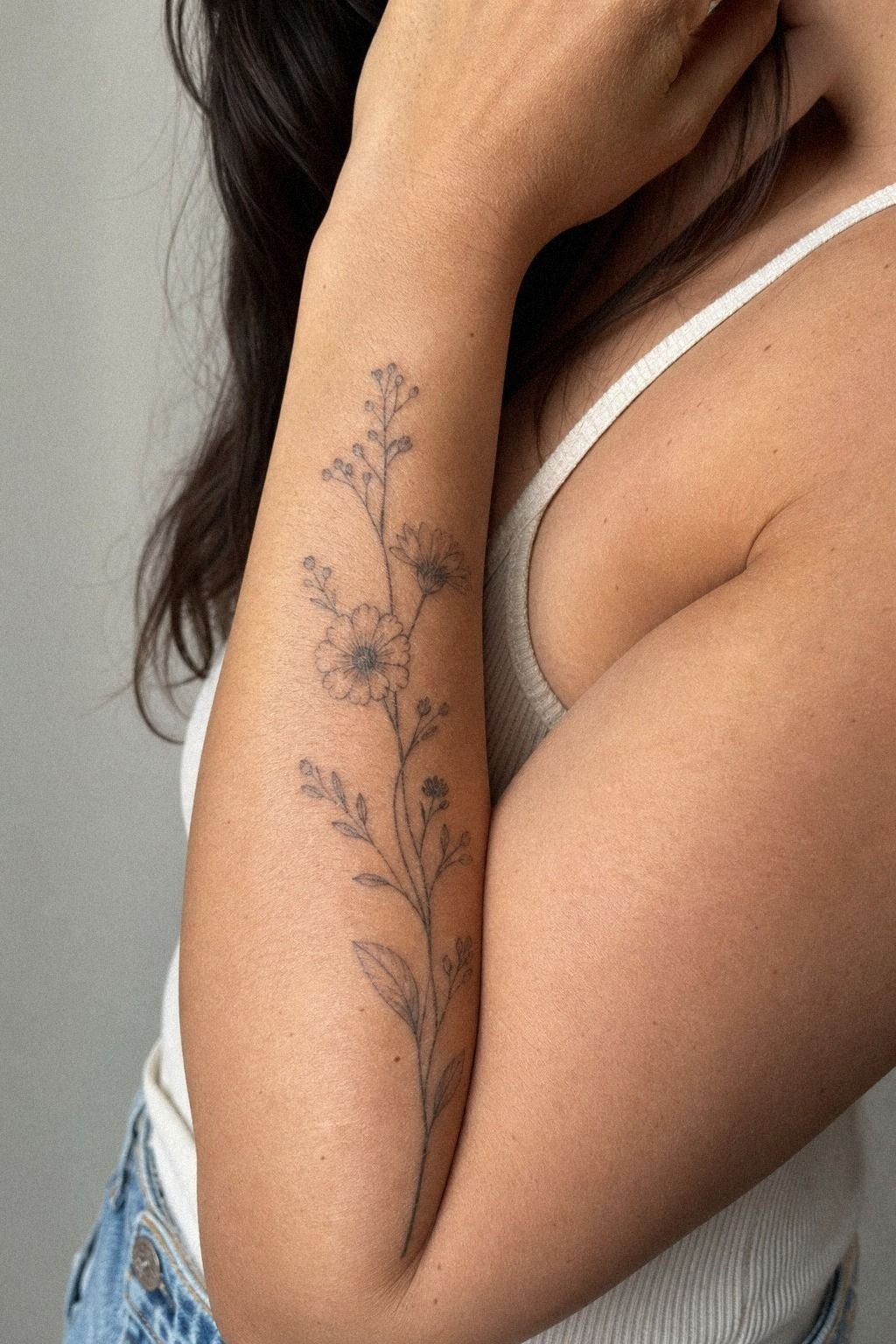 Place Wildflower Ink Along Forearm Skin