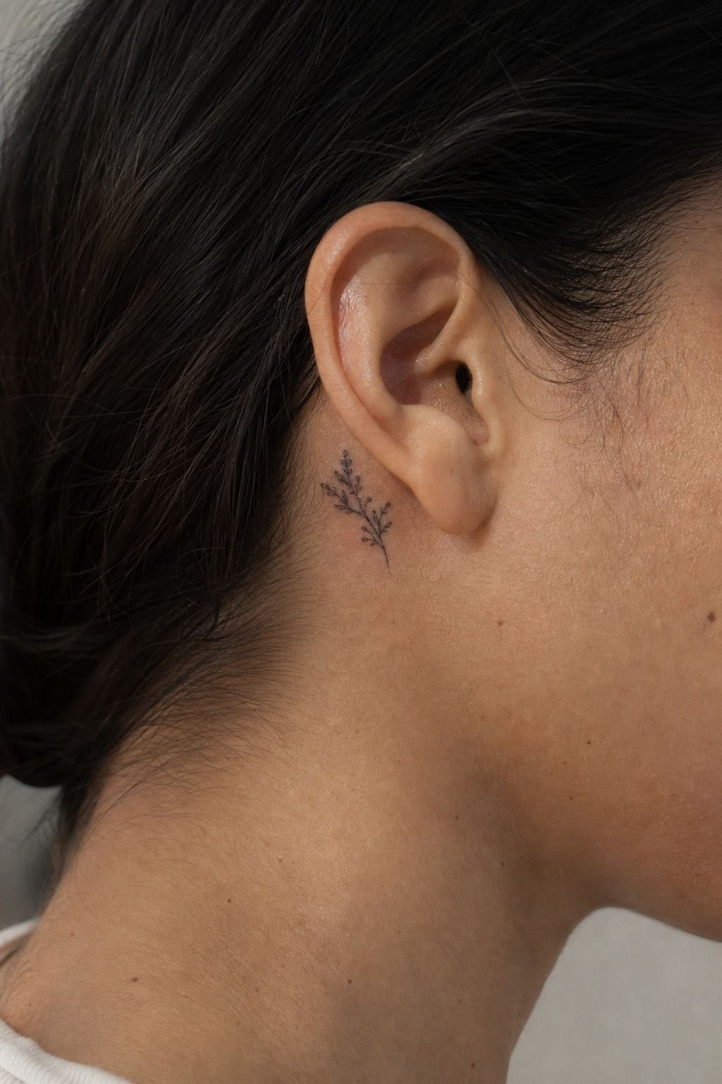 Place Tiny Ink Behind The Ear