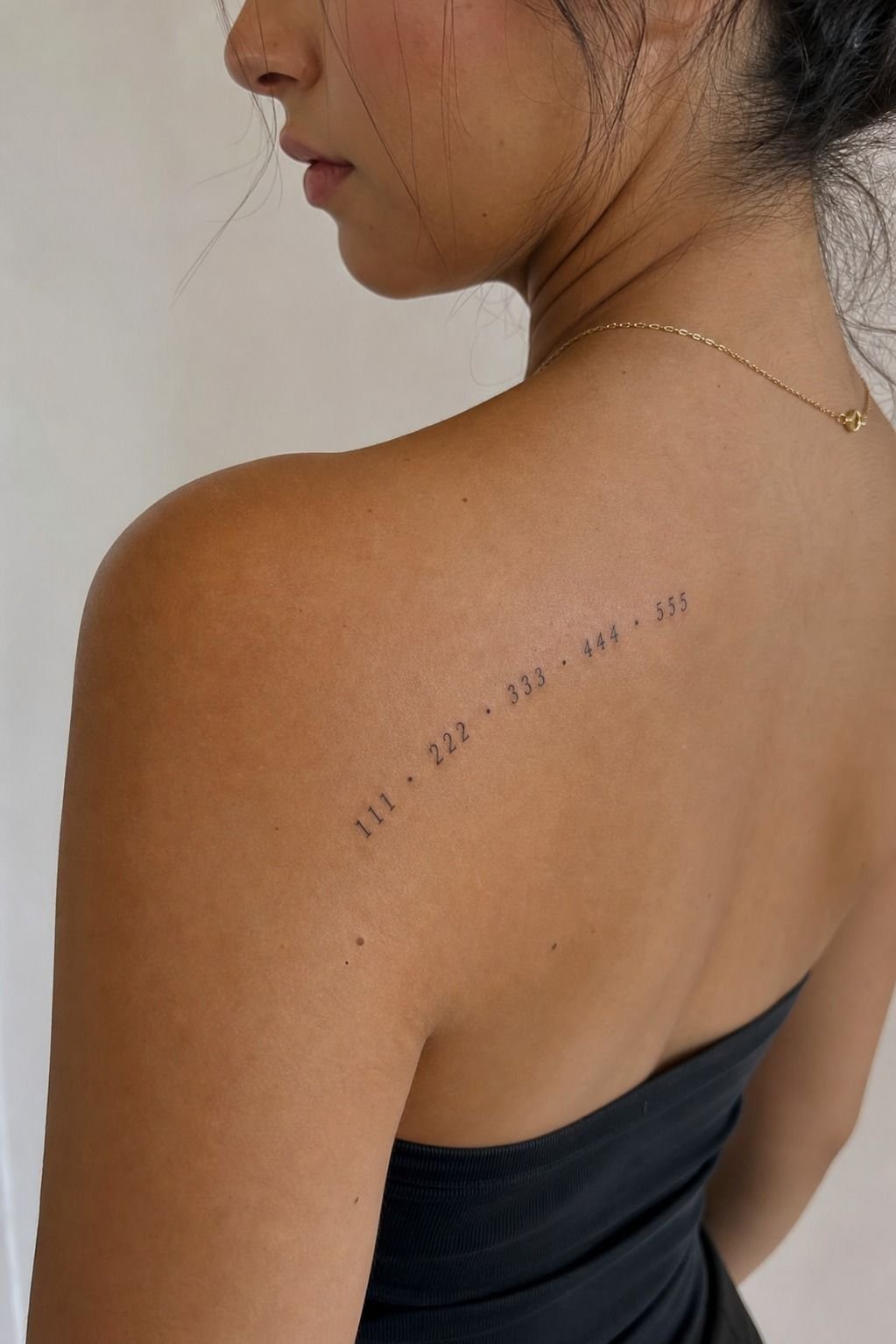Angel Numbers Placed Behind the Shoulder