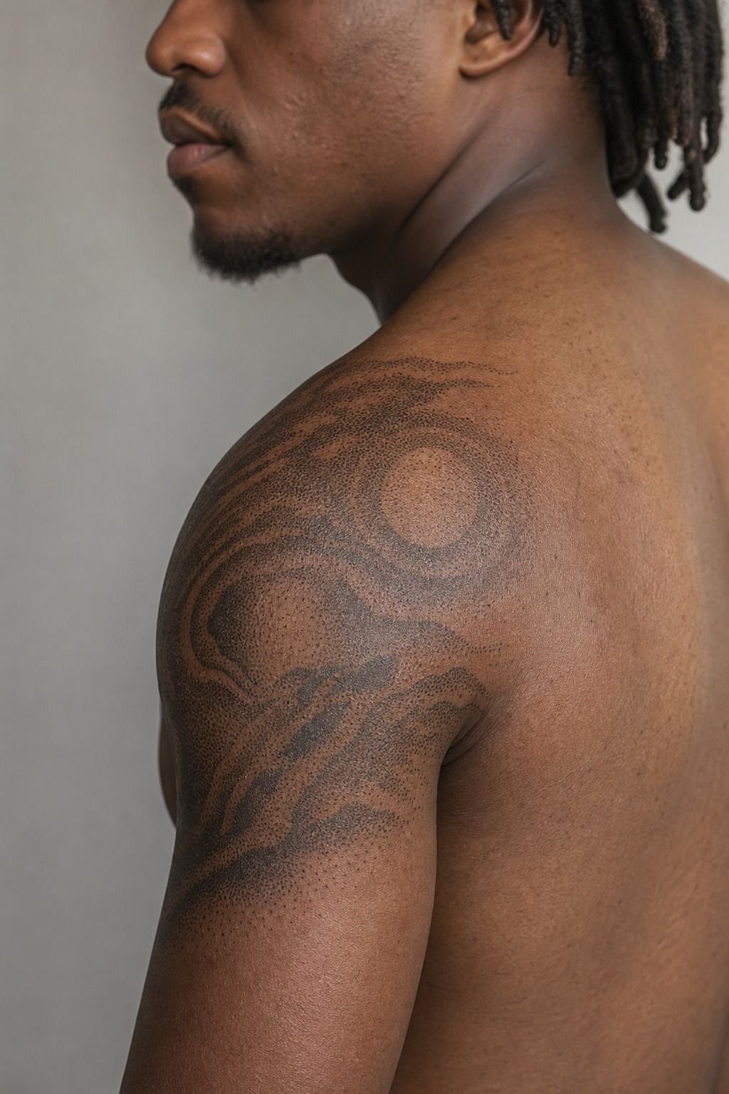 Start dotwork shading where the muscle rounds out