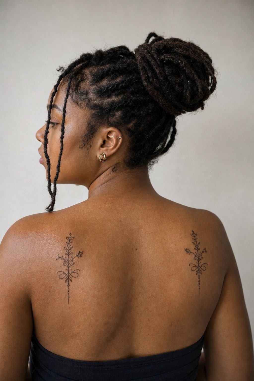 Matching Feminine Tattoos Across Both Shoulder Blades