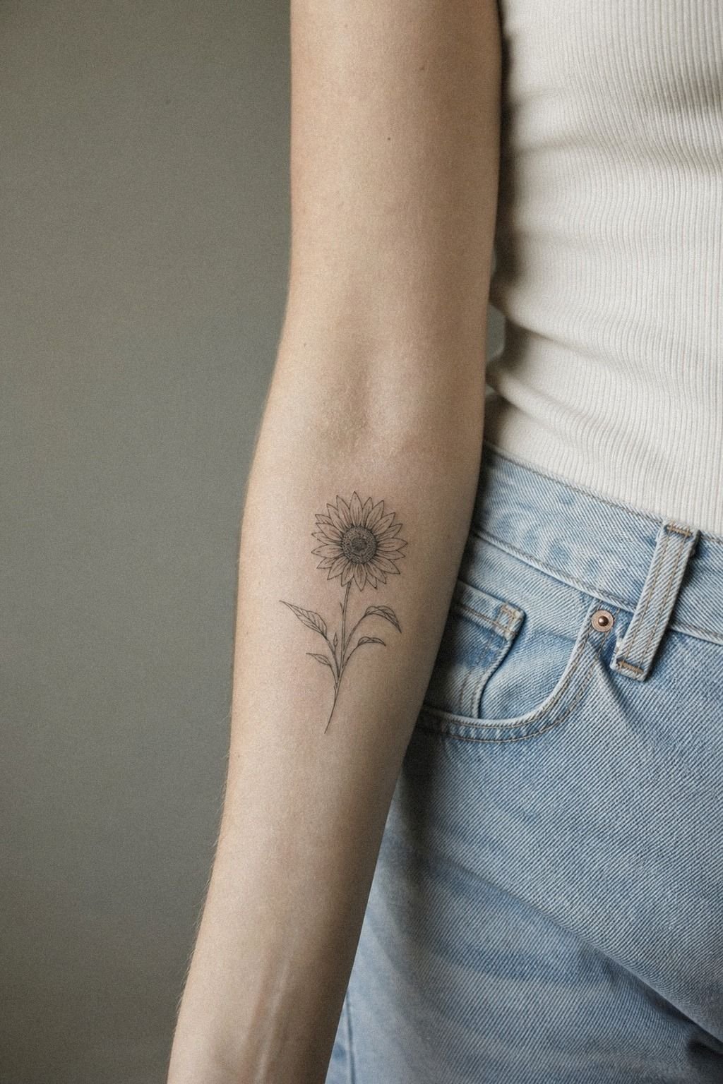 Start With A Minimal Sunflower Tattoo