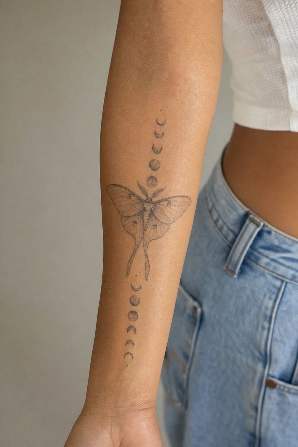 Luna Moth Forearm Tattoo With Moon Phases